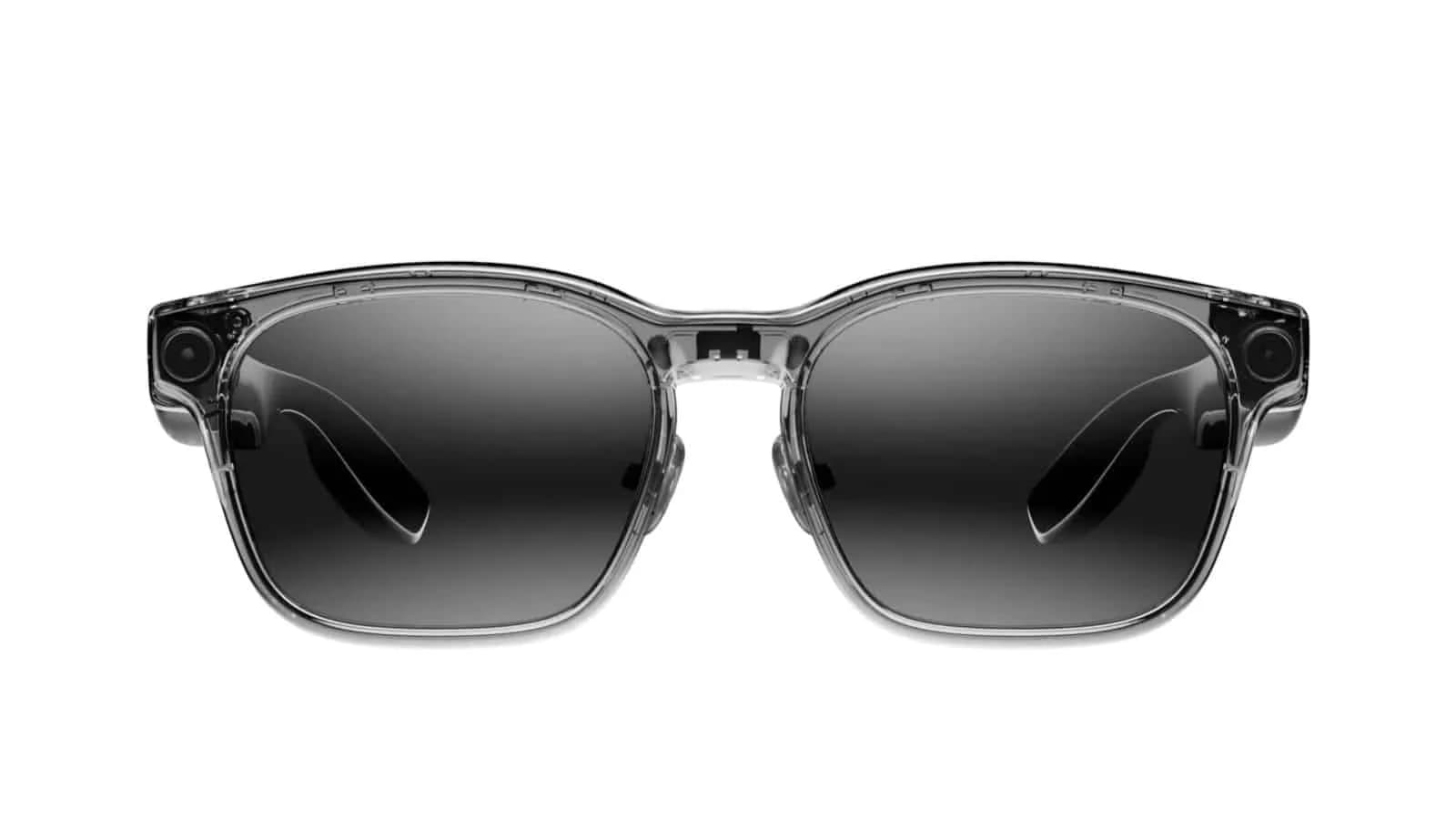 Gafas inteligentes Li Auto Livis, en gris humo translúcido, vistas de frente, con una lente de cámara redonda en cada esquina superior.