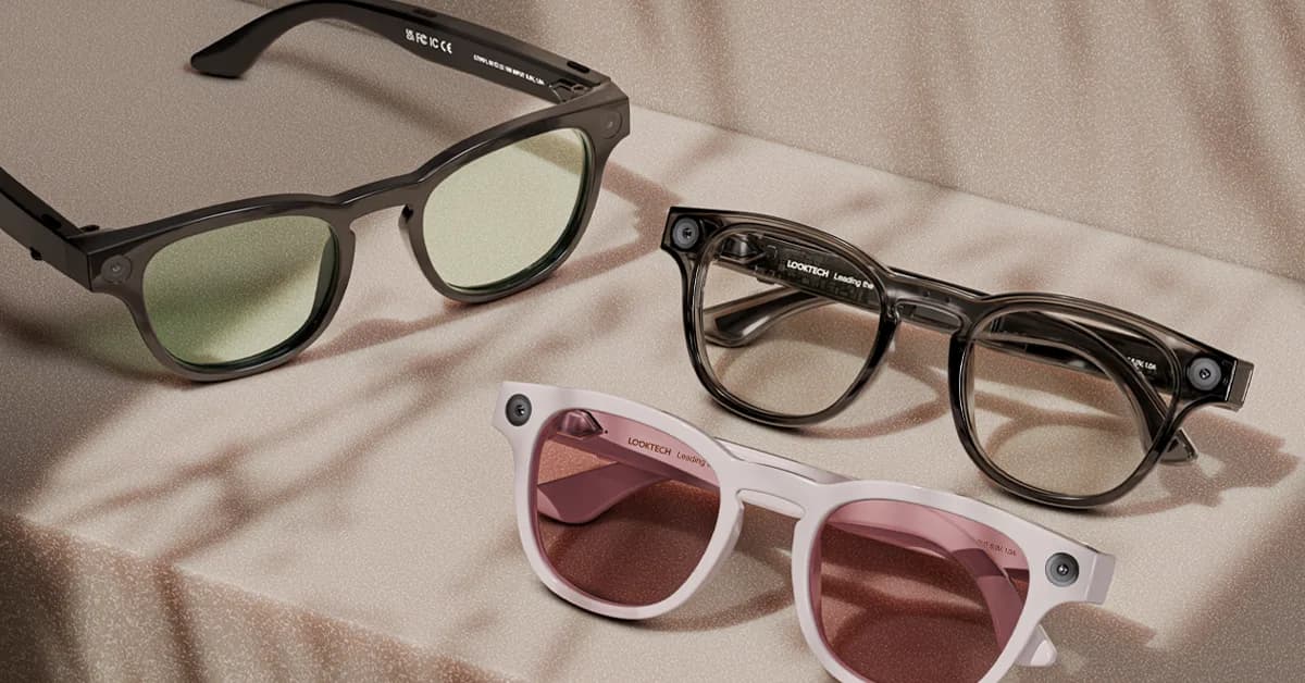 Looktech AI Glasses三色平放于布面上，方形镜框，镜腿带摄像头。
