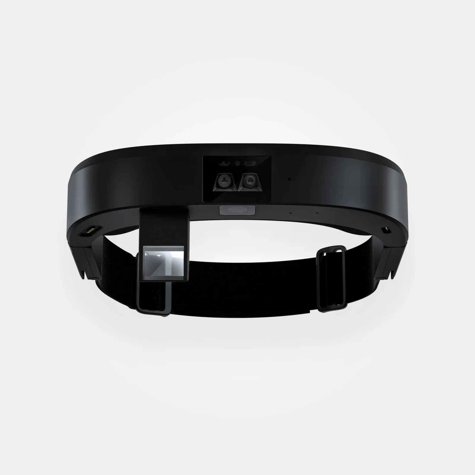 Auricular RealWear Arc 3 en negro sobre fondo blanco, con la banda para la cabeza, las dos cámaras frontales y el brazo con la pantalla.
