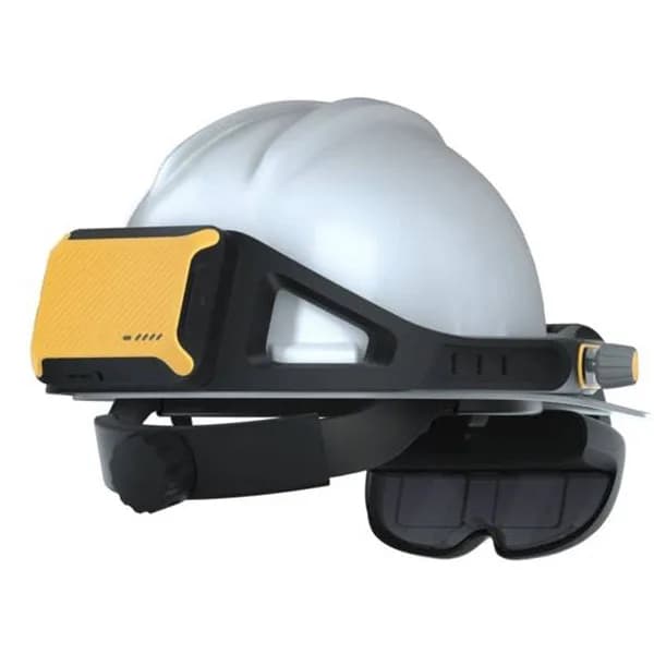 Rokid Glass Enterprise's black and yellow headset clipped to a white hard hat, with a dark tinted visor flipped down over the eye.