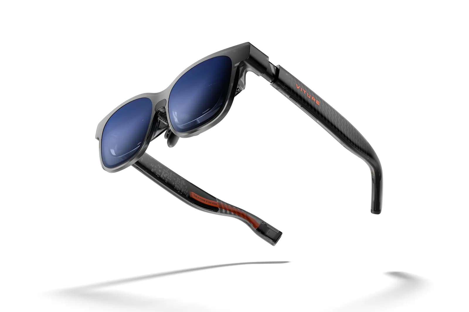 VITURE Luma XR Glasses in smoke gray, shown at an angle with blue mirrored lenses and an orange VITURE logo on the temple, white background.