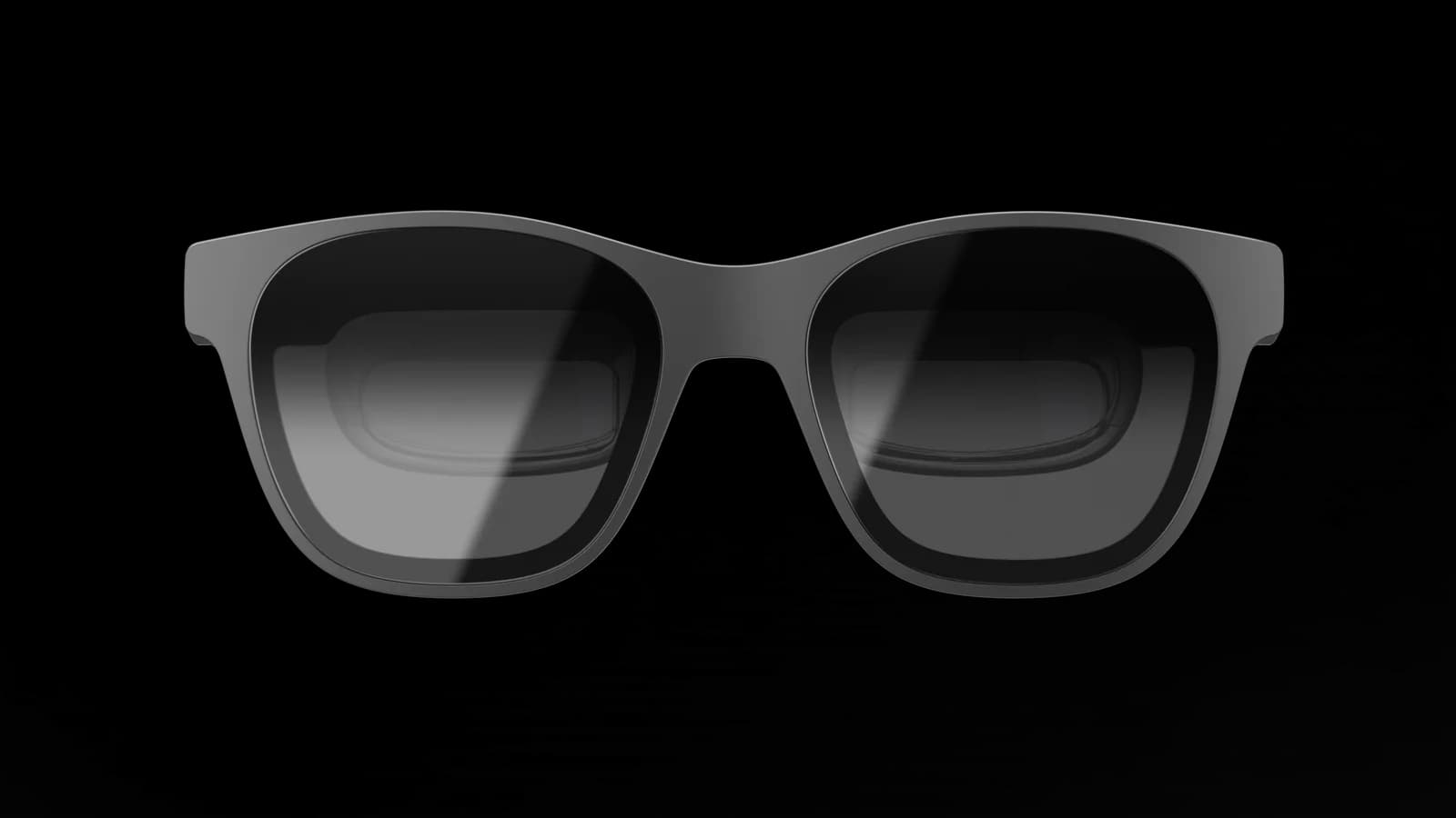 XREAL Air 2 Pro glasses in graphite gray, seen from the front on a plain background, with a thick square frame and dark gradient lenses.