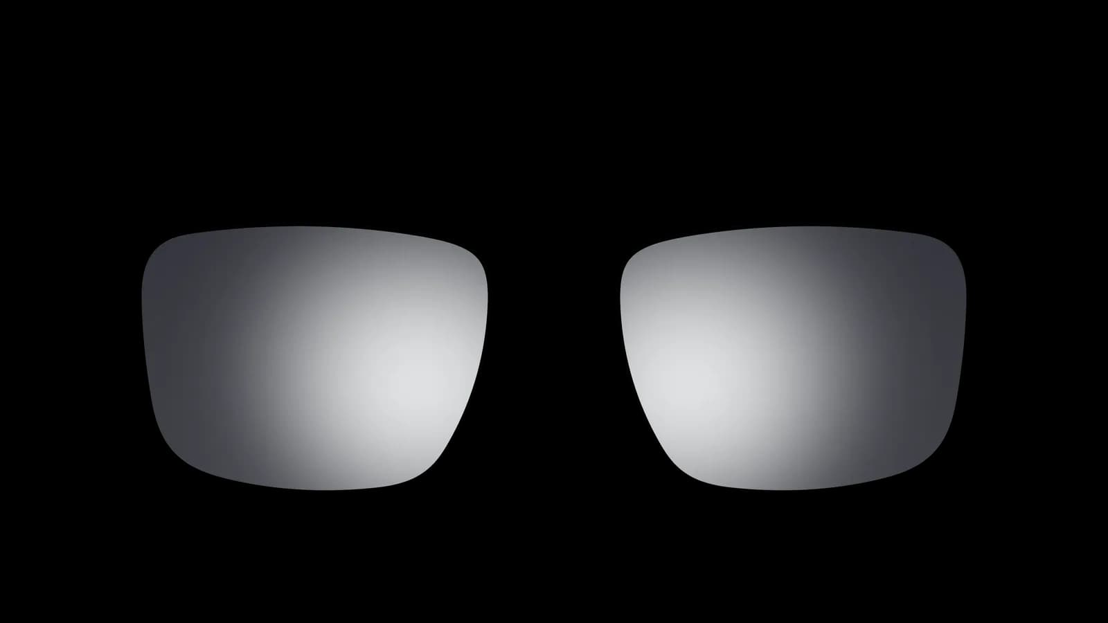 Bose Frames replacement lenses alone, a rectangular pair with a silver mirrored tint and no frame around them.