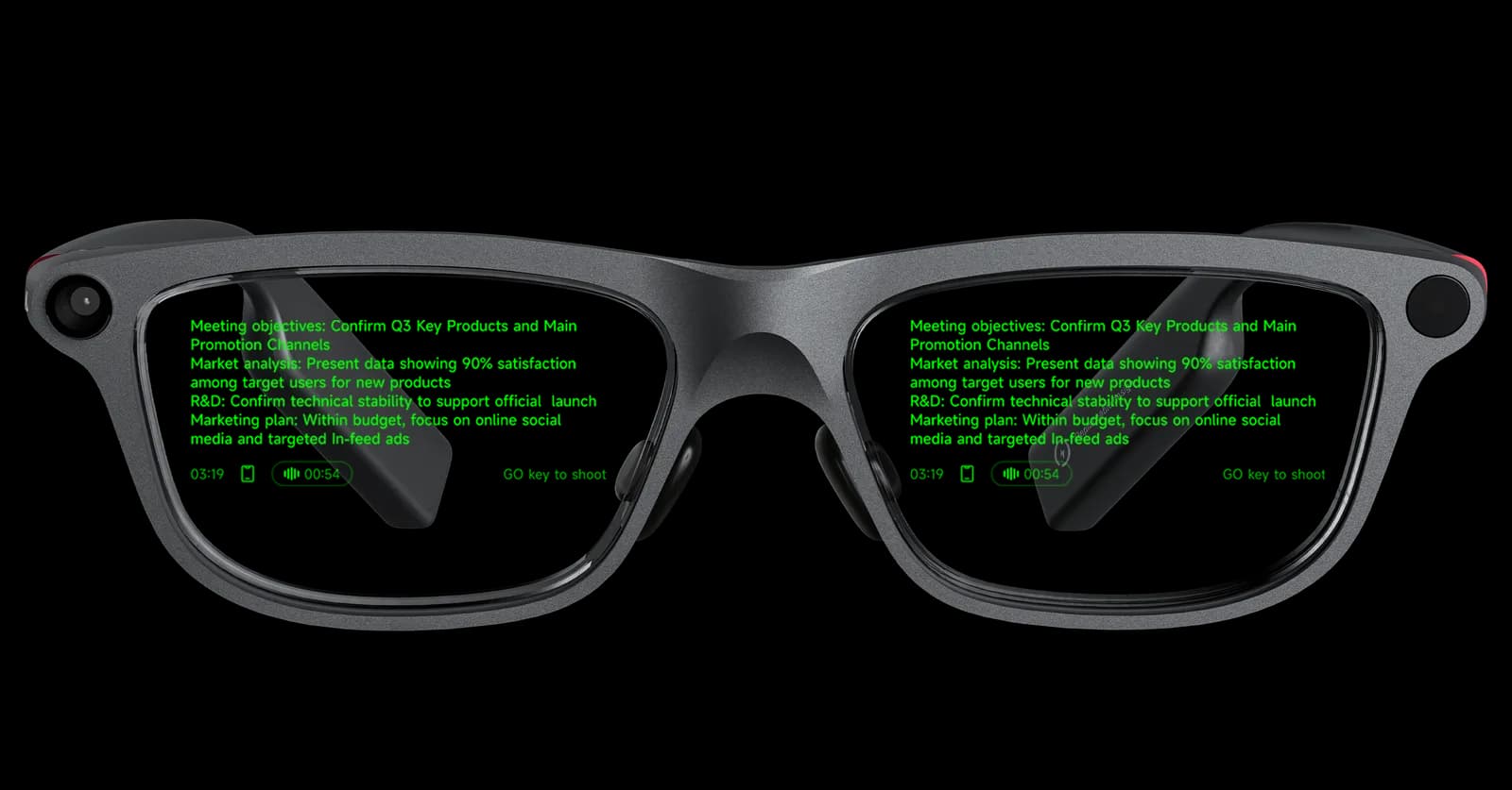 INMO GO3 with green heads-up display text visible in both lenses, showing meeting notes, a timer and a battery icon.
