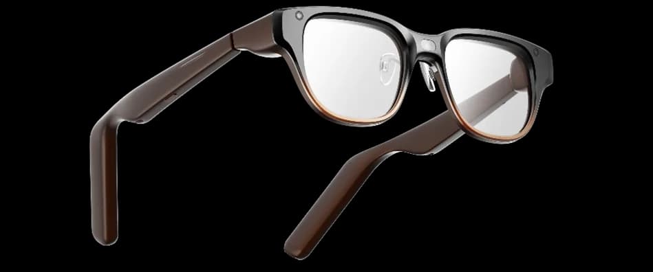 Gafas Lenovo AI Glasses Concept, en gris con degradado a marrón, vistas de frente en ángulo, con una cámara redonda en cada esquina superior del armazón.