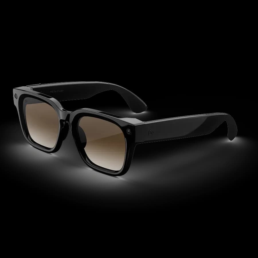 Meta Glasses Fury at an angle, black square frame with gradient brown lenses and 'Meta Fury' printed on the temple.