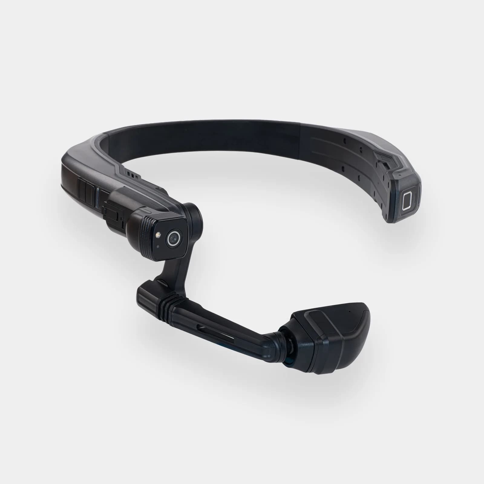 RealWear Navigator 500 headset in dark gray on a white background, showing the headband, camera module, and the swing arm boom.