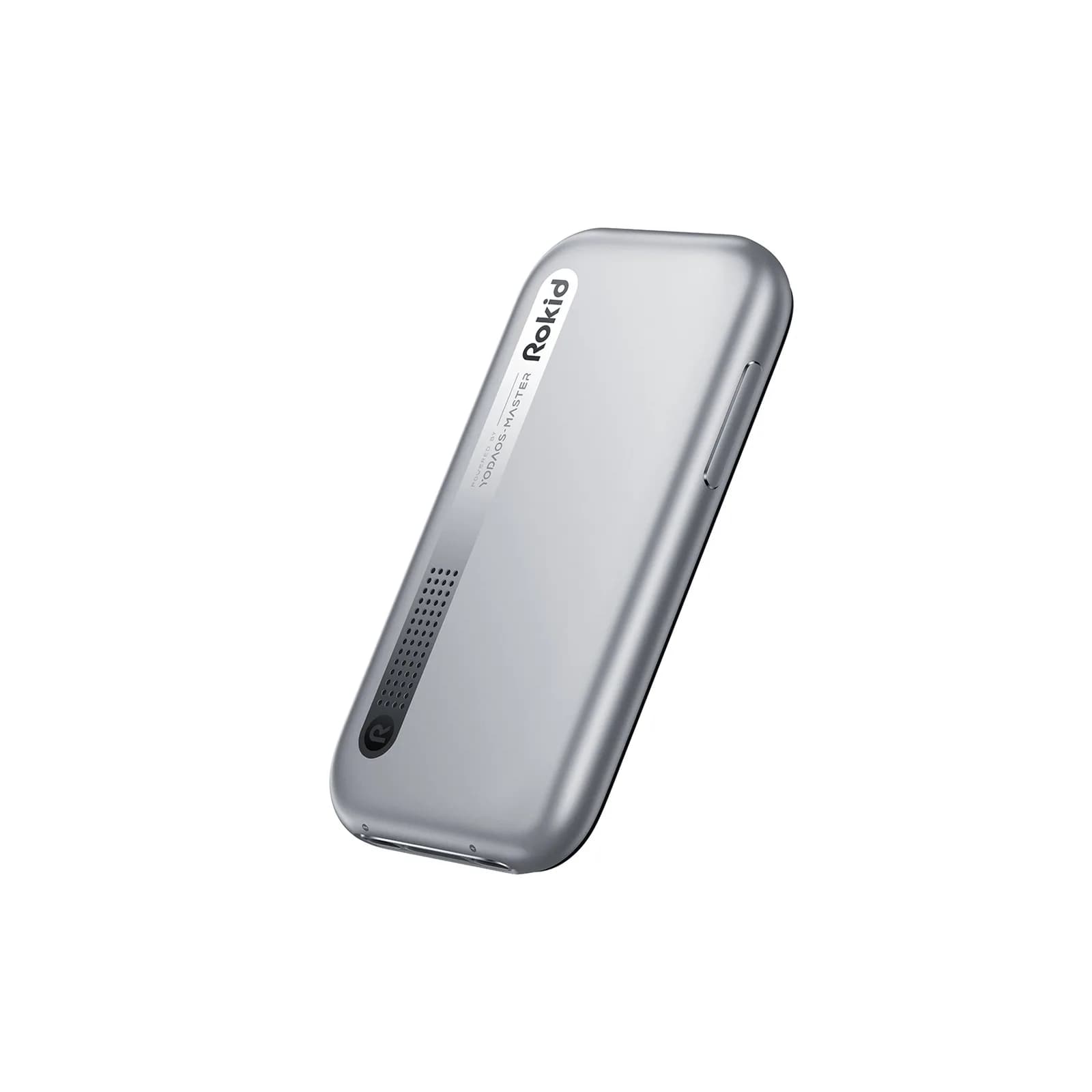 A smooth gray puck-shaped device for the Rokid Max 2, printed with Rokid and Powered by YodaOS-Master, with a side button and a speaker grille.