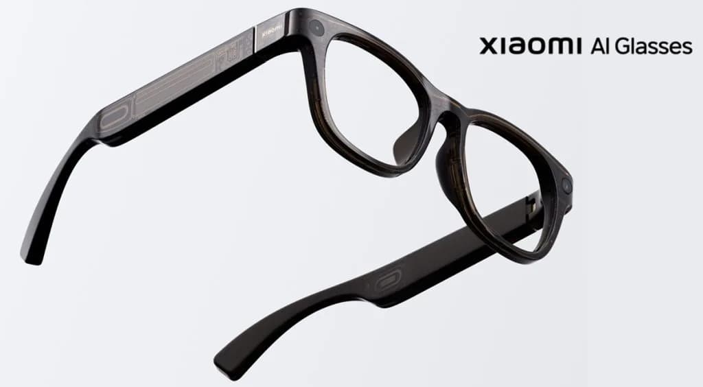 Xiaomi AI Glasses in translucent dark gray, folded and seen from the side, with a small camera near the hinge.